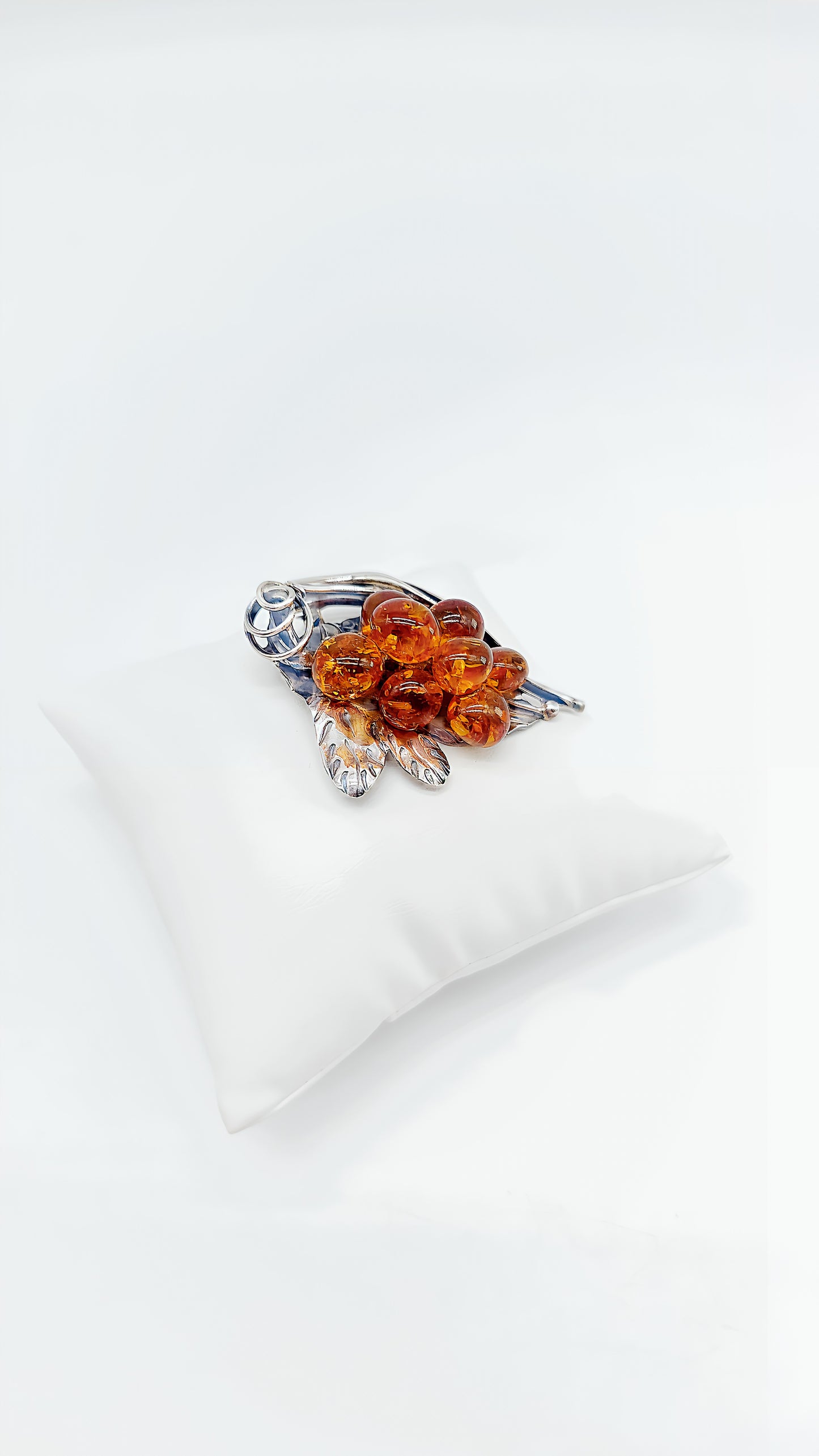 Amber dream: Unique silver brooch