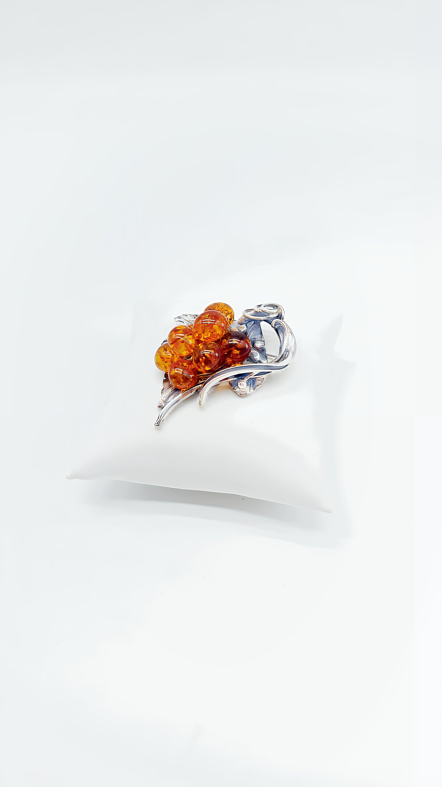 Amber dream: Unique silver brooch