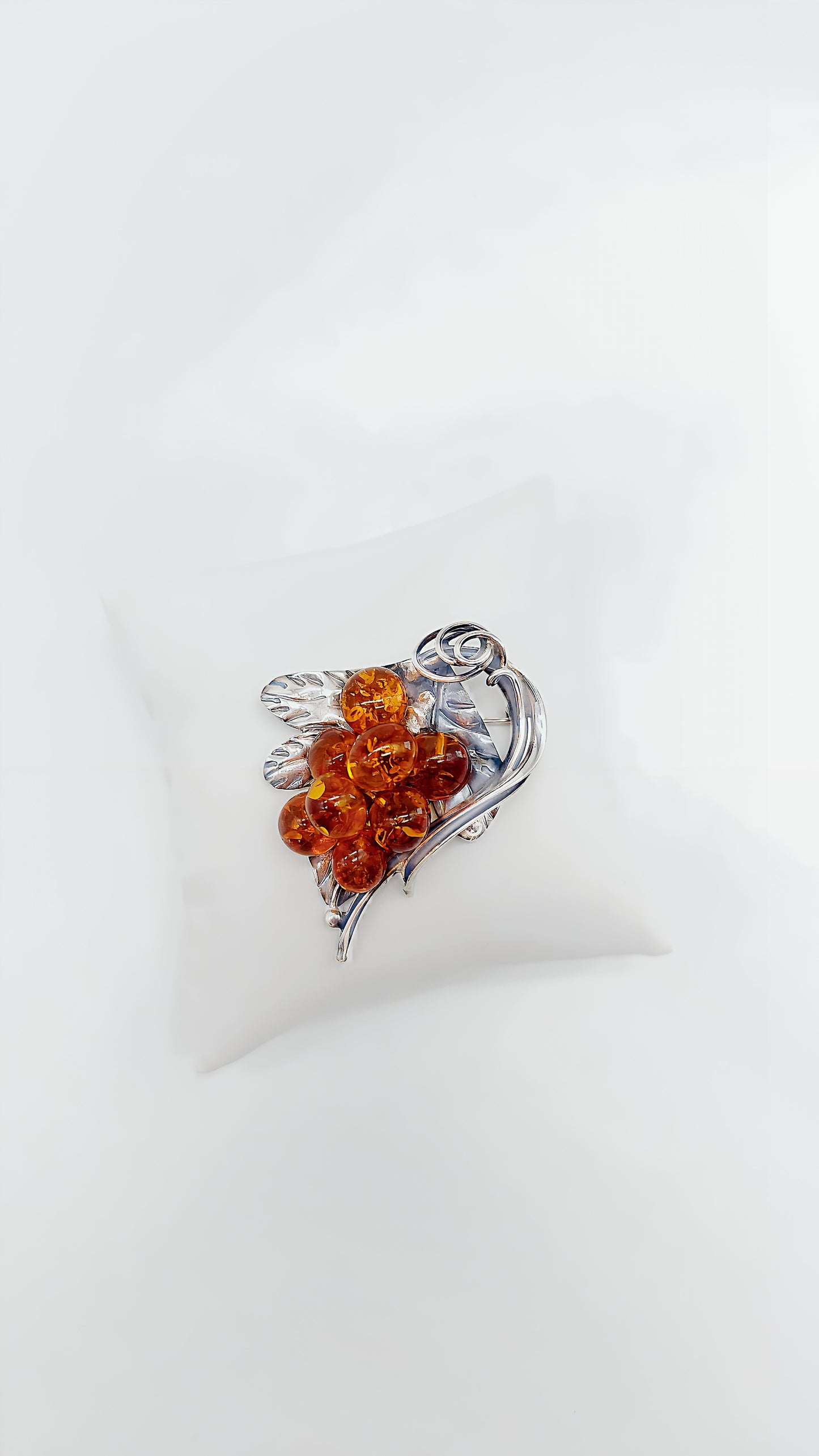 Amber dream: Unique silver brooch
