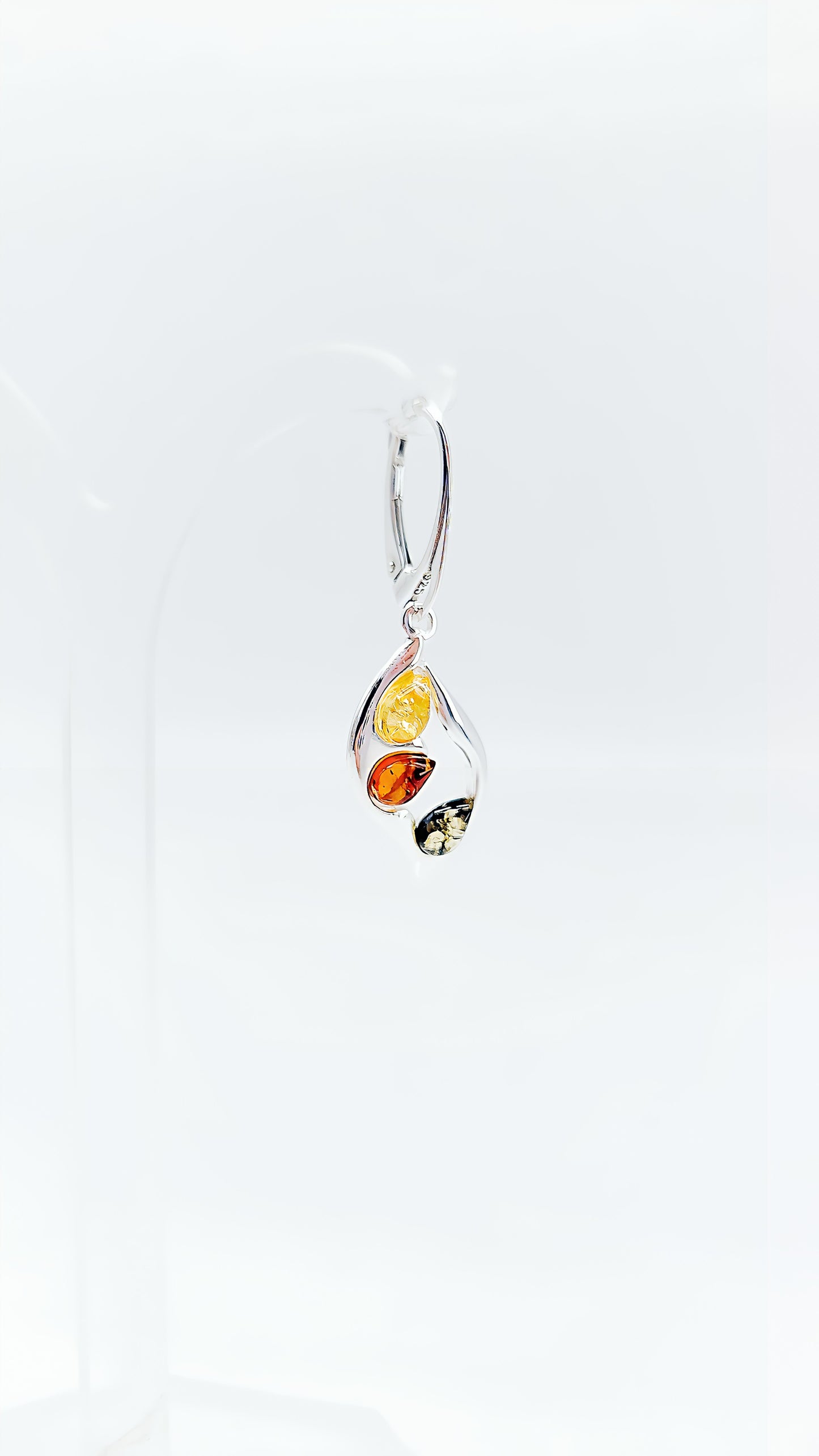 Colorful amber earrings: silver meets diversity