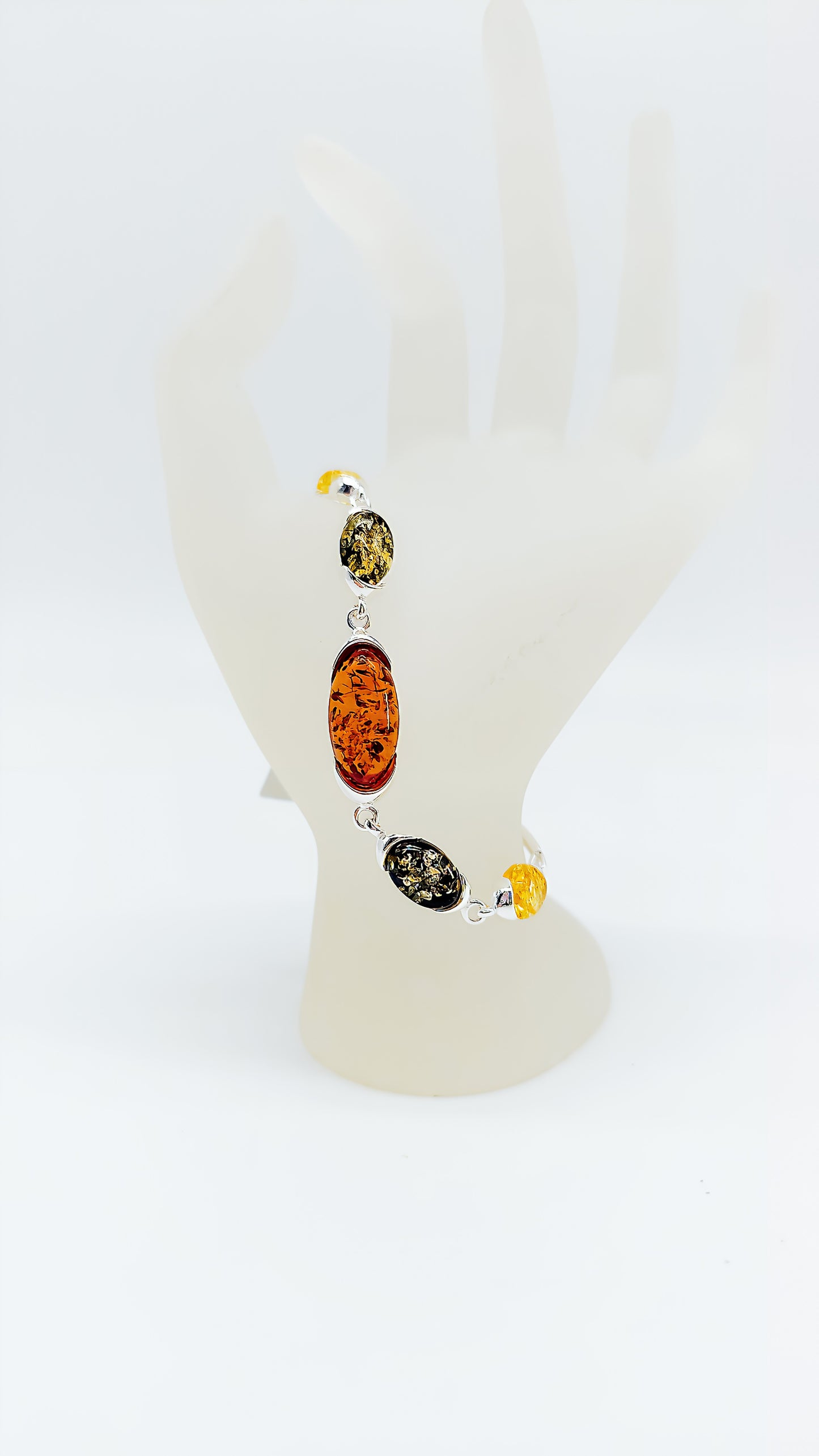 Play of colors in nature: Colorful amber bracelet in silver