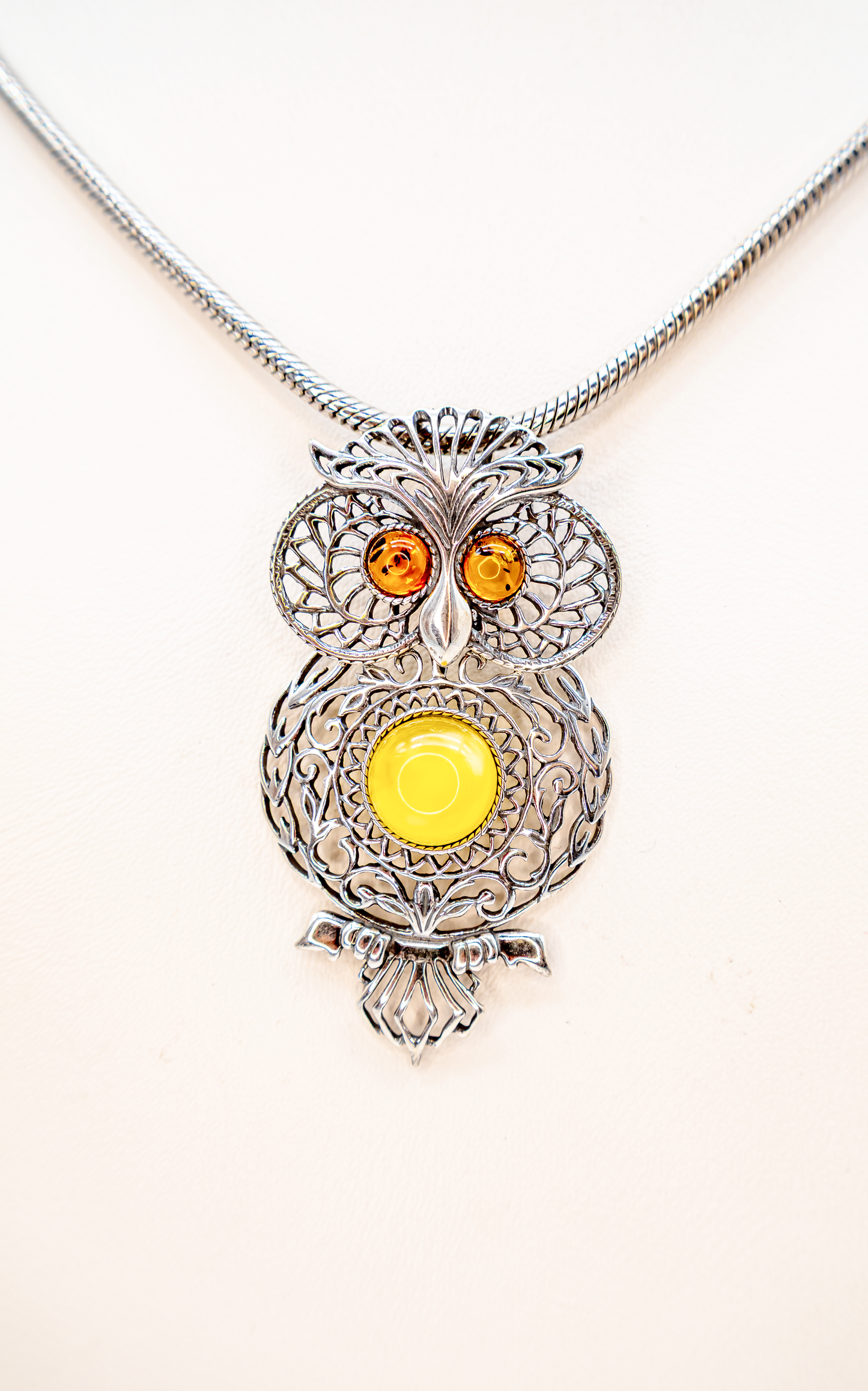Unique owl pendant – silver & amber design