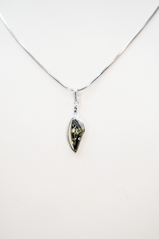 Modern amber pendant made of sterling silver