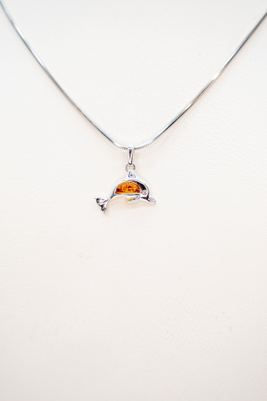 Dolphin pendant made of silver with genuine amber