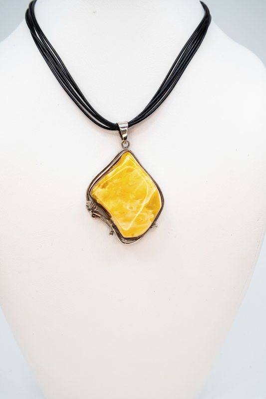 Eye-catching amber pendant silver unique design
