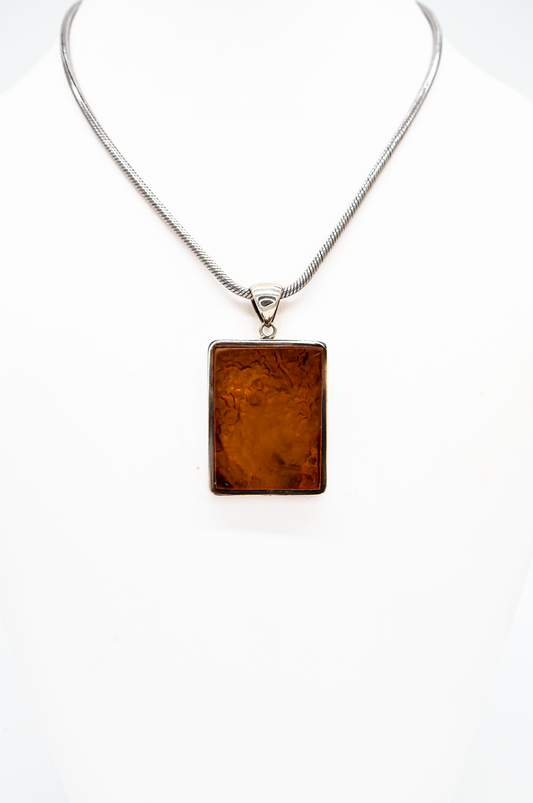 Handmade amber pendant – modern design unique piece