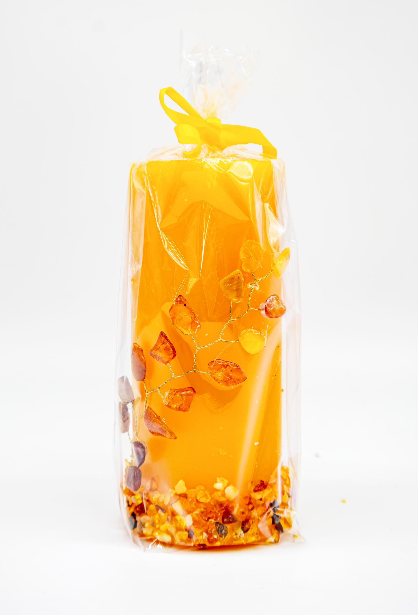 Geschenkidee Kerze: Facettierte Form mit Bernstein-Bäumchen