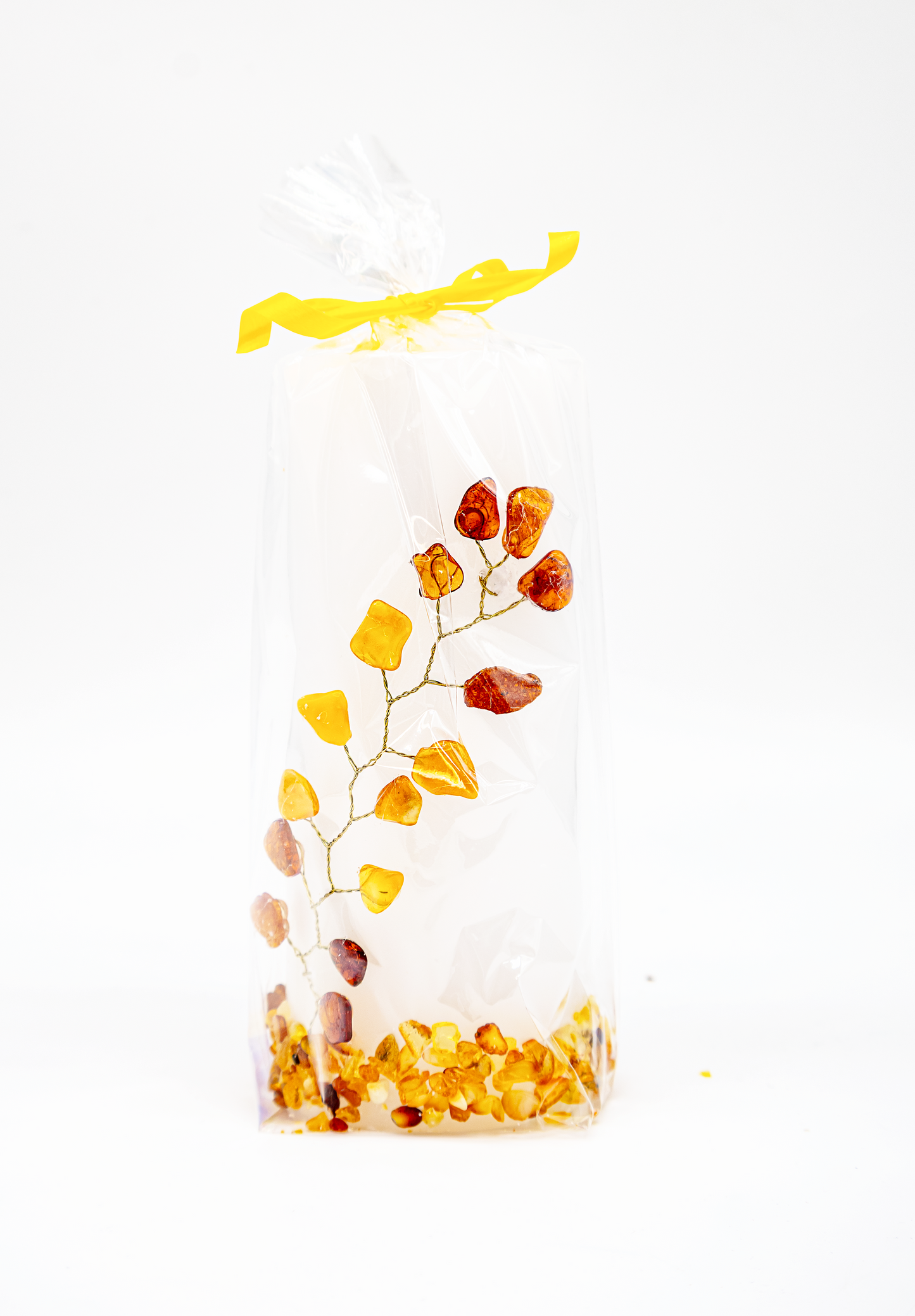Gift idea candle: Faceted shape with amber tree