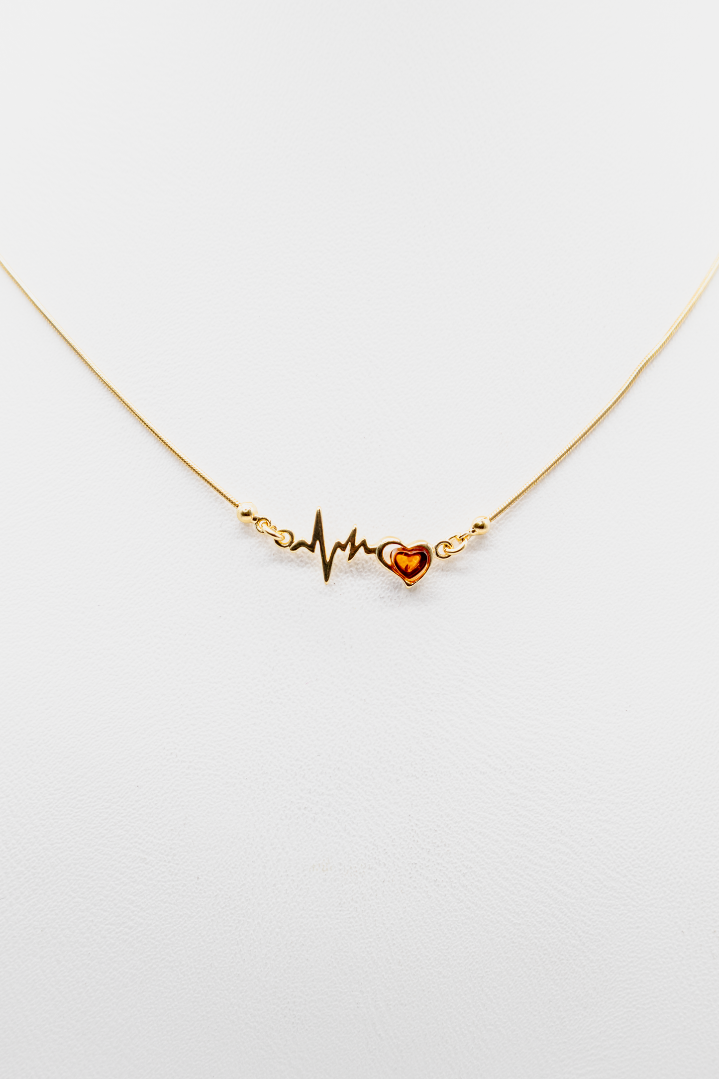 Romantisches Collier: EKG-Linie in Gold mit Bernstein