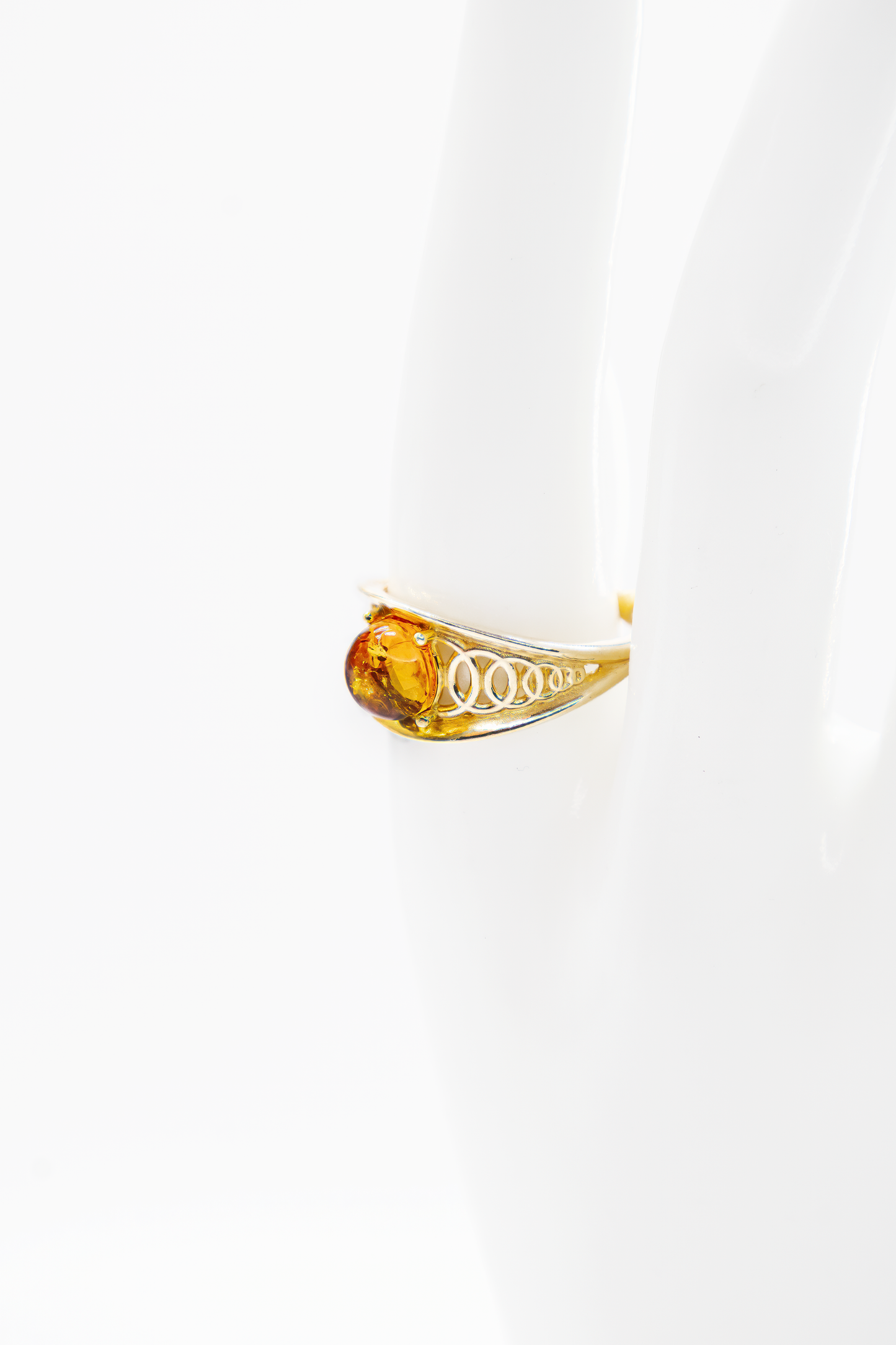 Vergulde barnsteenring – elegante klassieker
