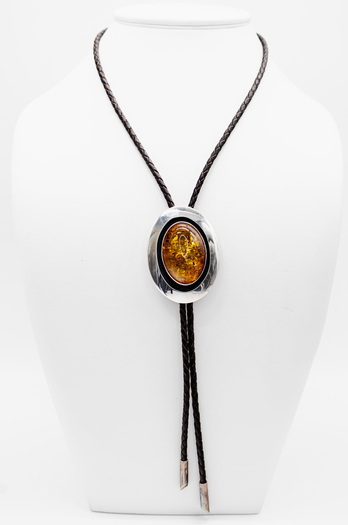 Amber pendant in 925 sterling silver on a leather cord – adjustable & modern