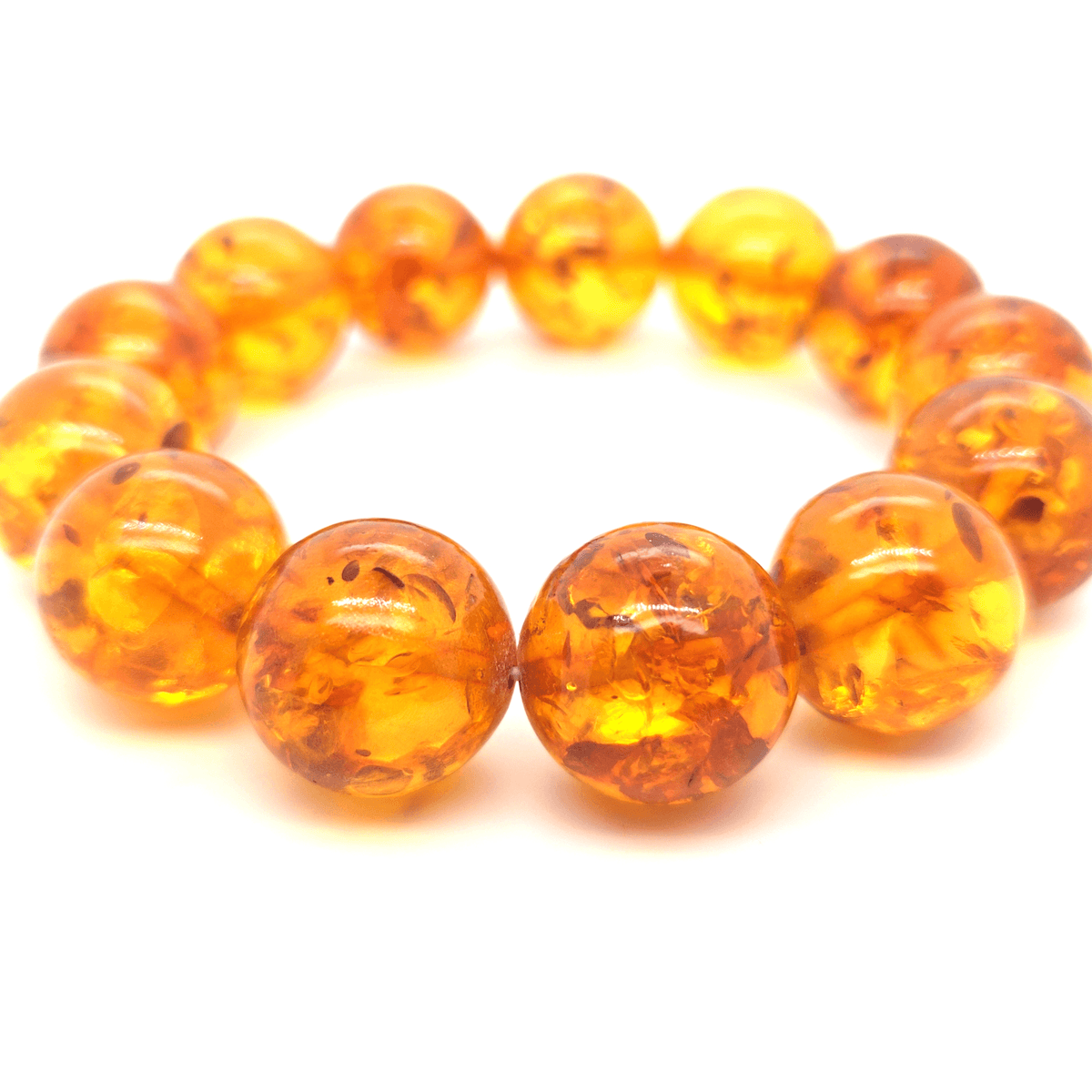 Unikat Bernsteinarmband in Orange mit Sonnenflitter – elastisch, echter Ostsee-Bernstein