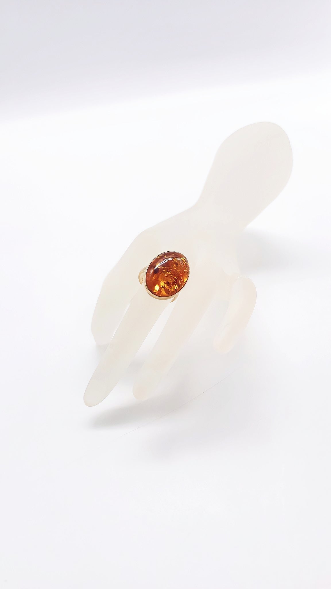Shiny amber ring in a noble design