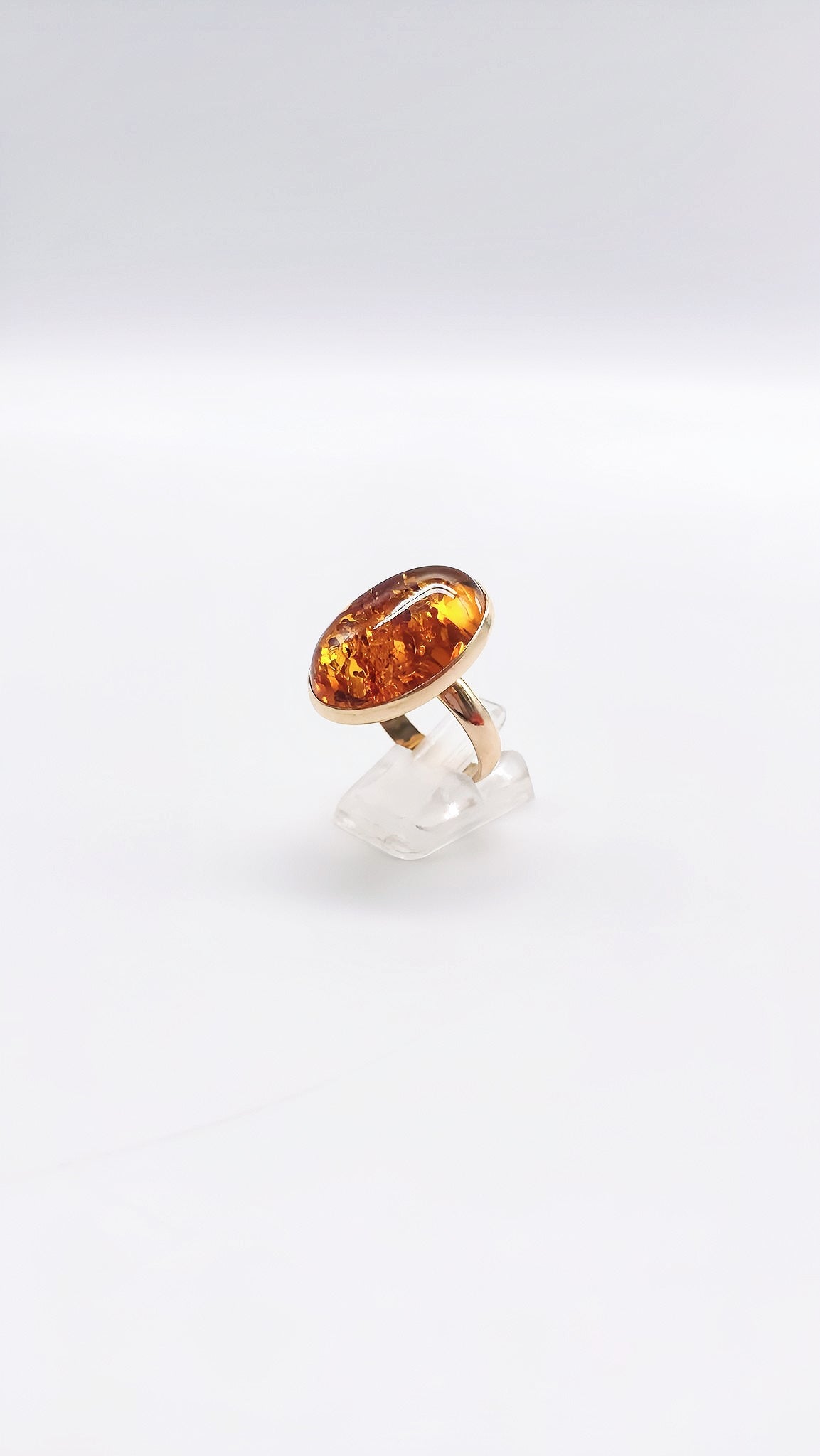 Shiny amber ring in a noble design