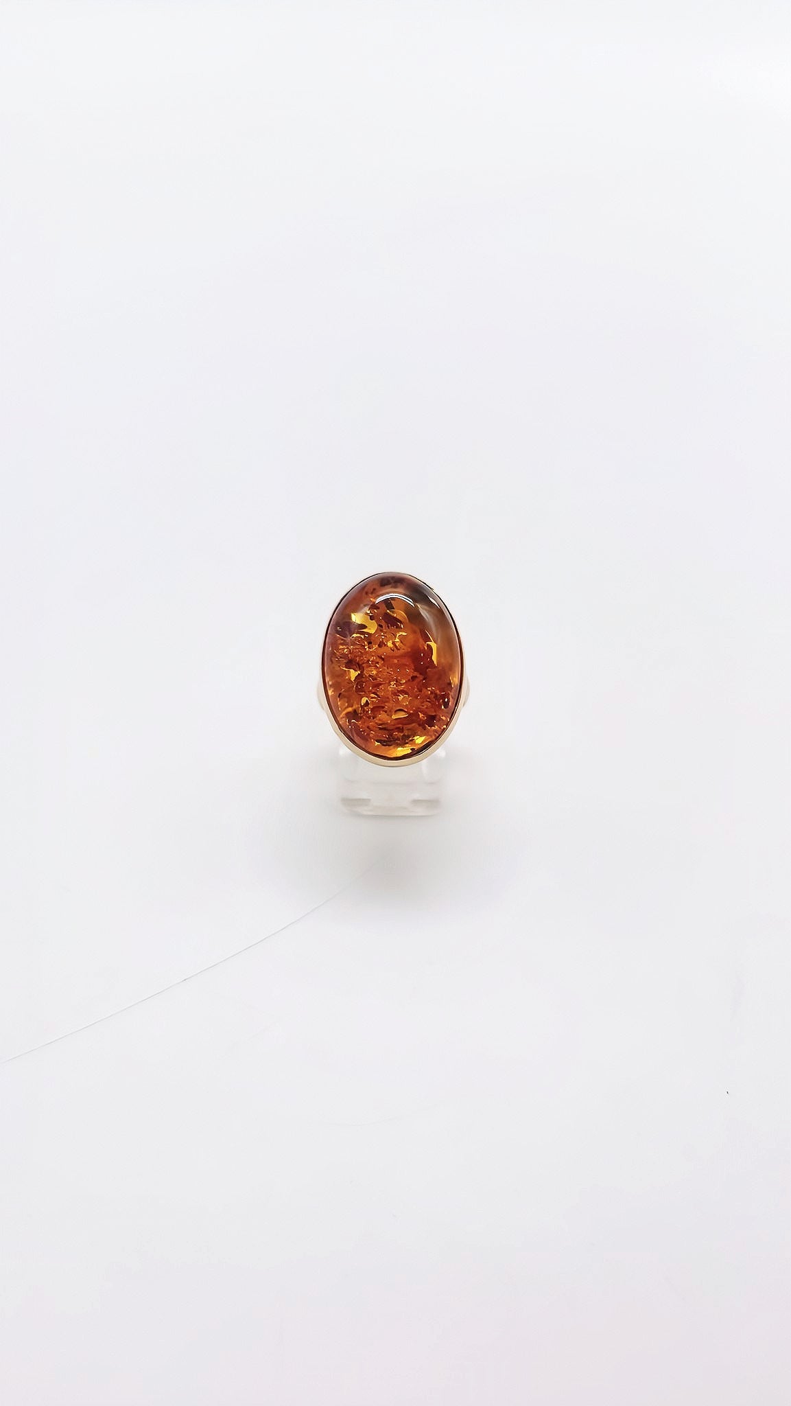 Shiny amber ring in a noble design