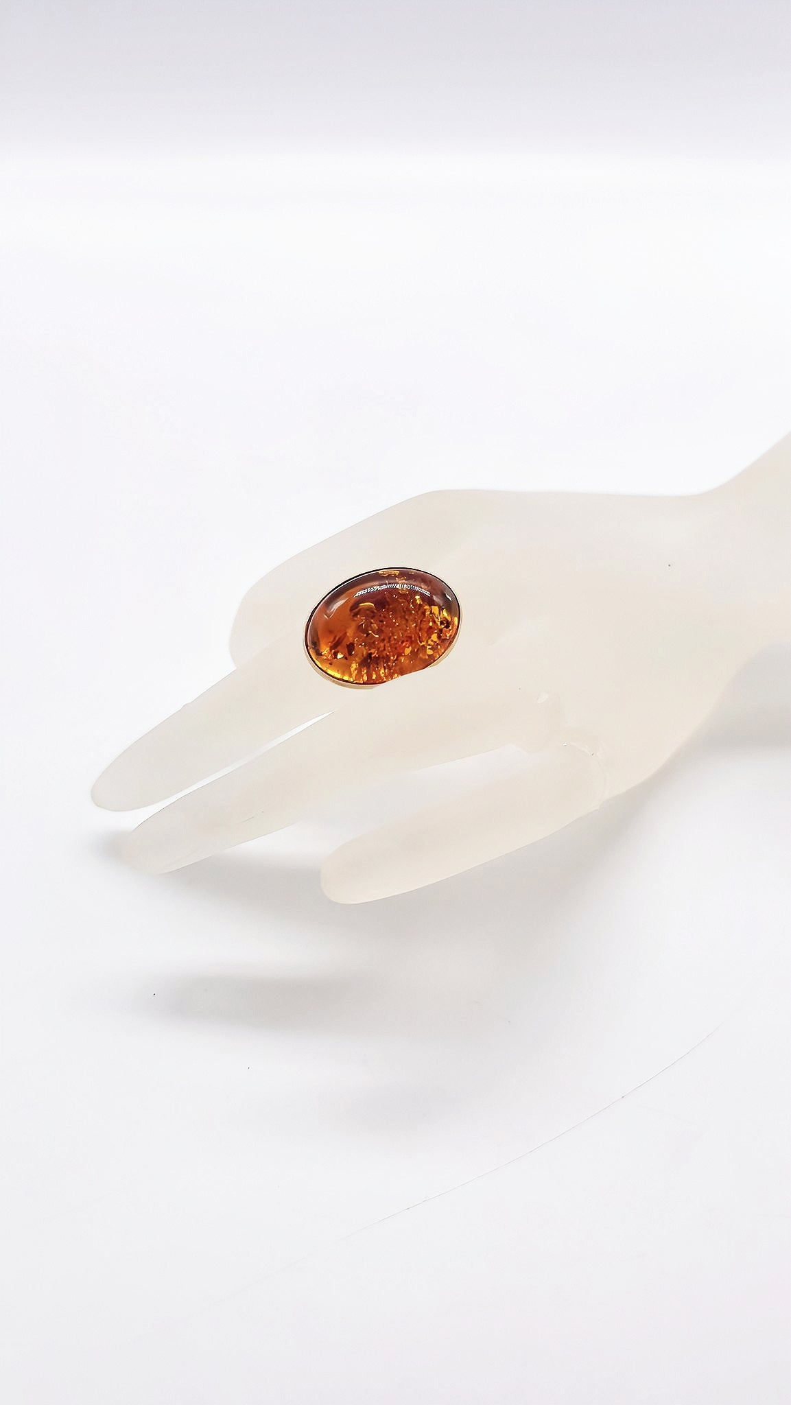 Shiny amber ring in a noble design