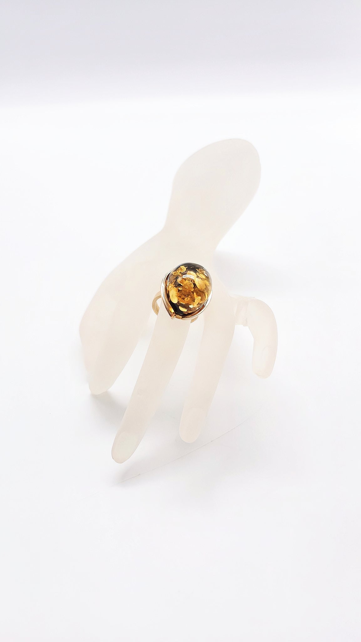 Elegant style: amber in gold setting