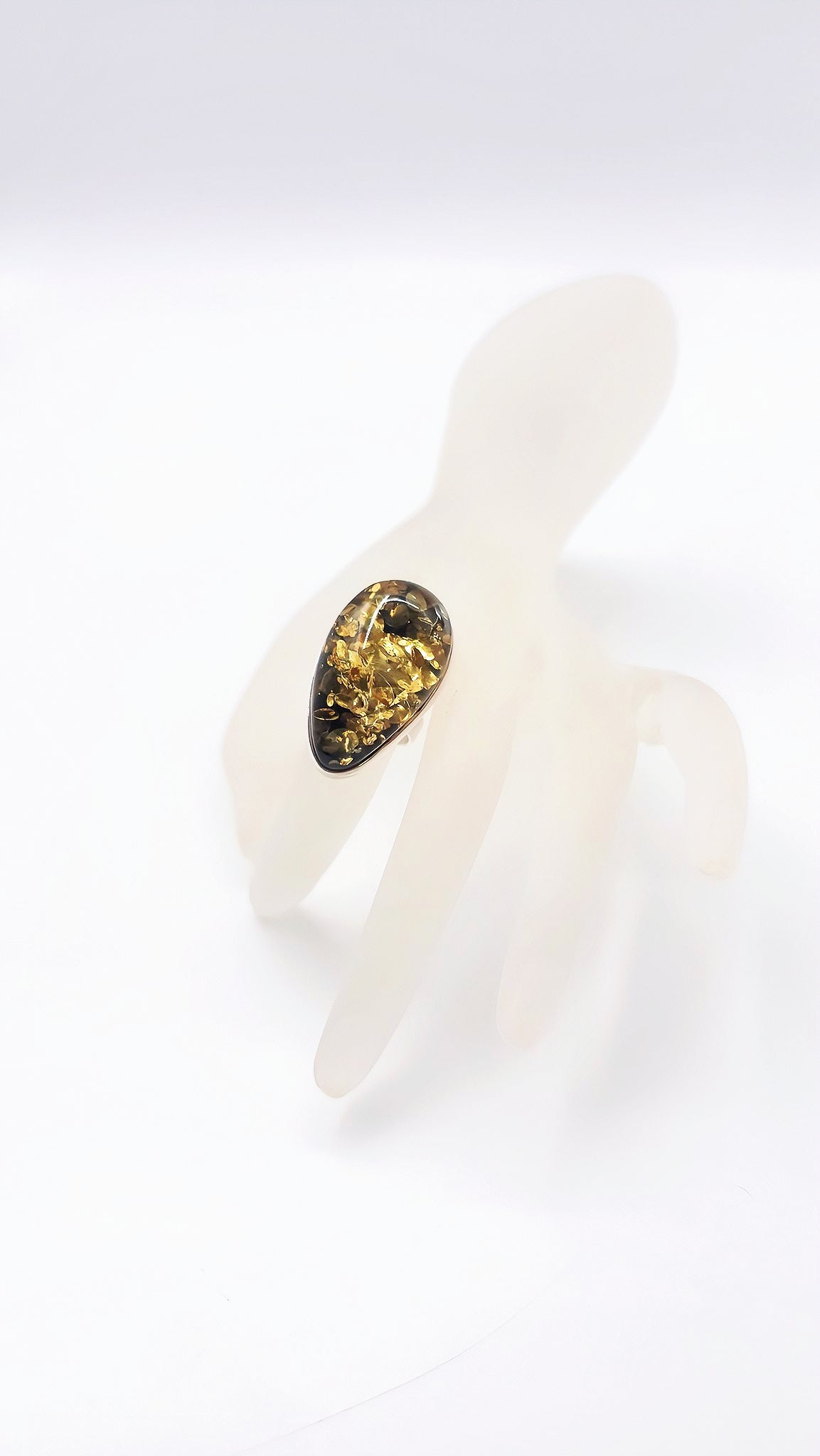 Unique jewelry: drop-shaped amber ring made of 925 silver