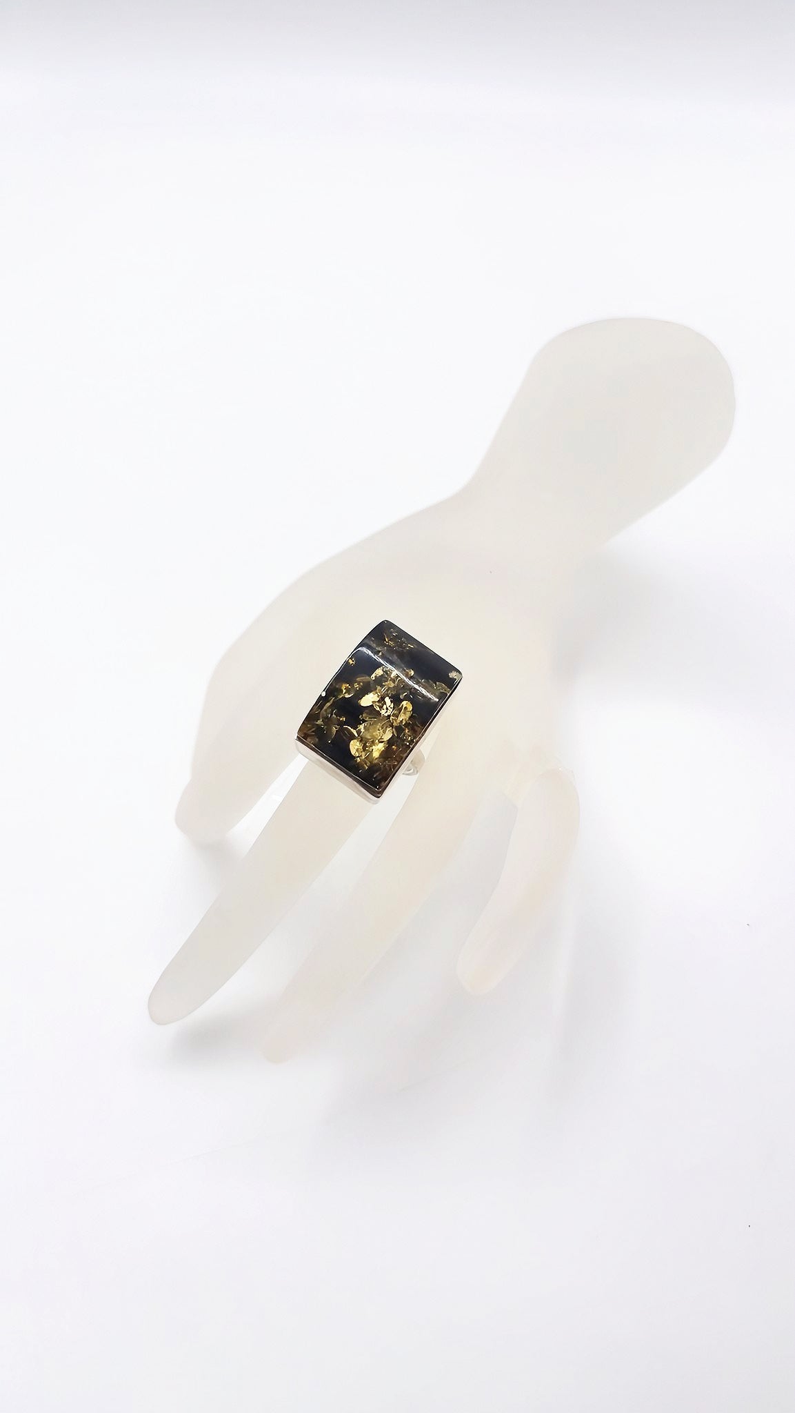 Adjustable silver ring with green amber – Handmade design