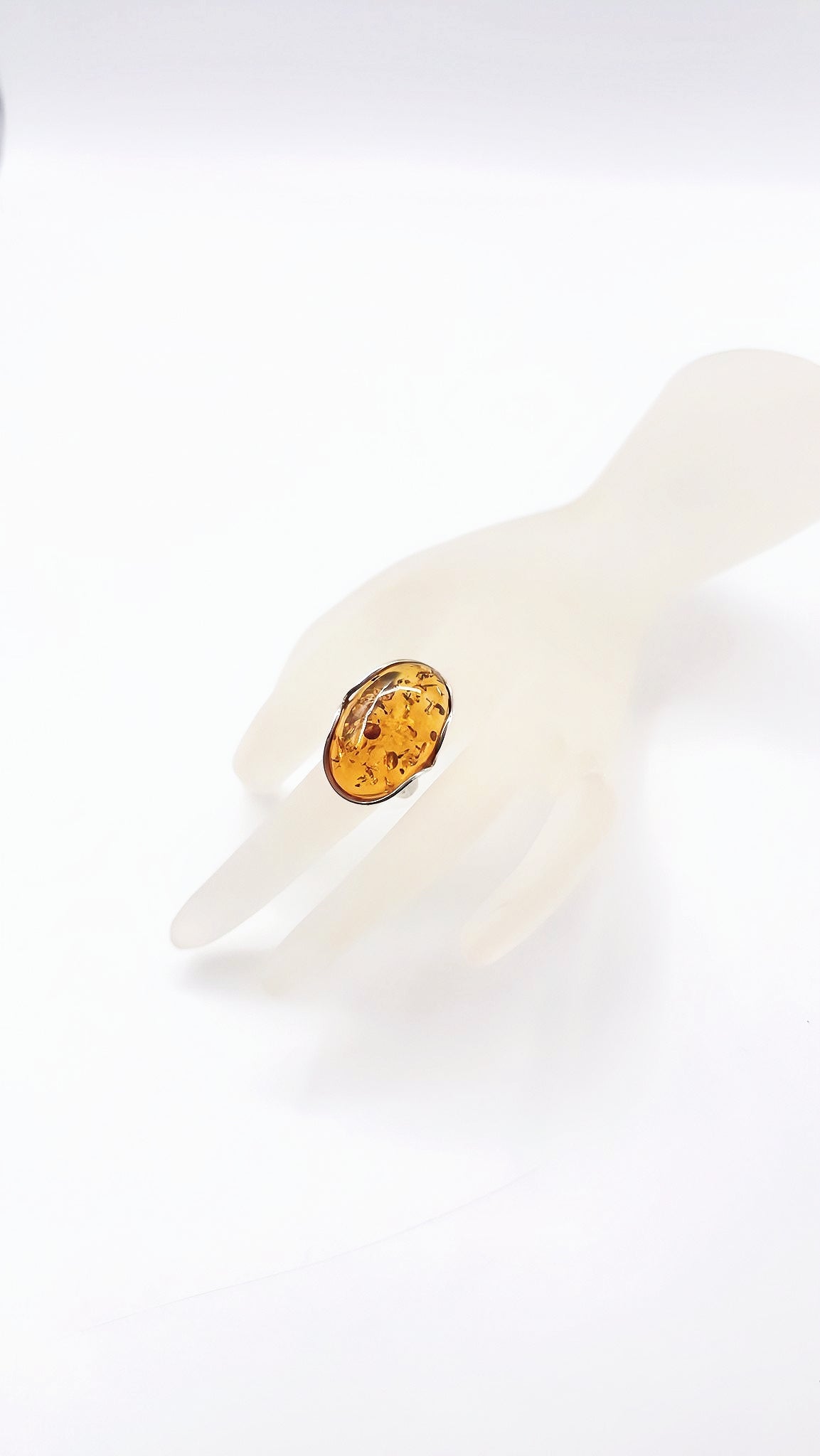 Adjustable silver ring with amber – nature meets style