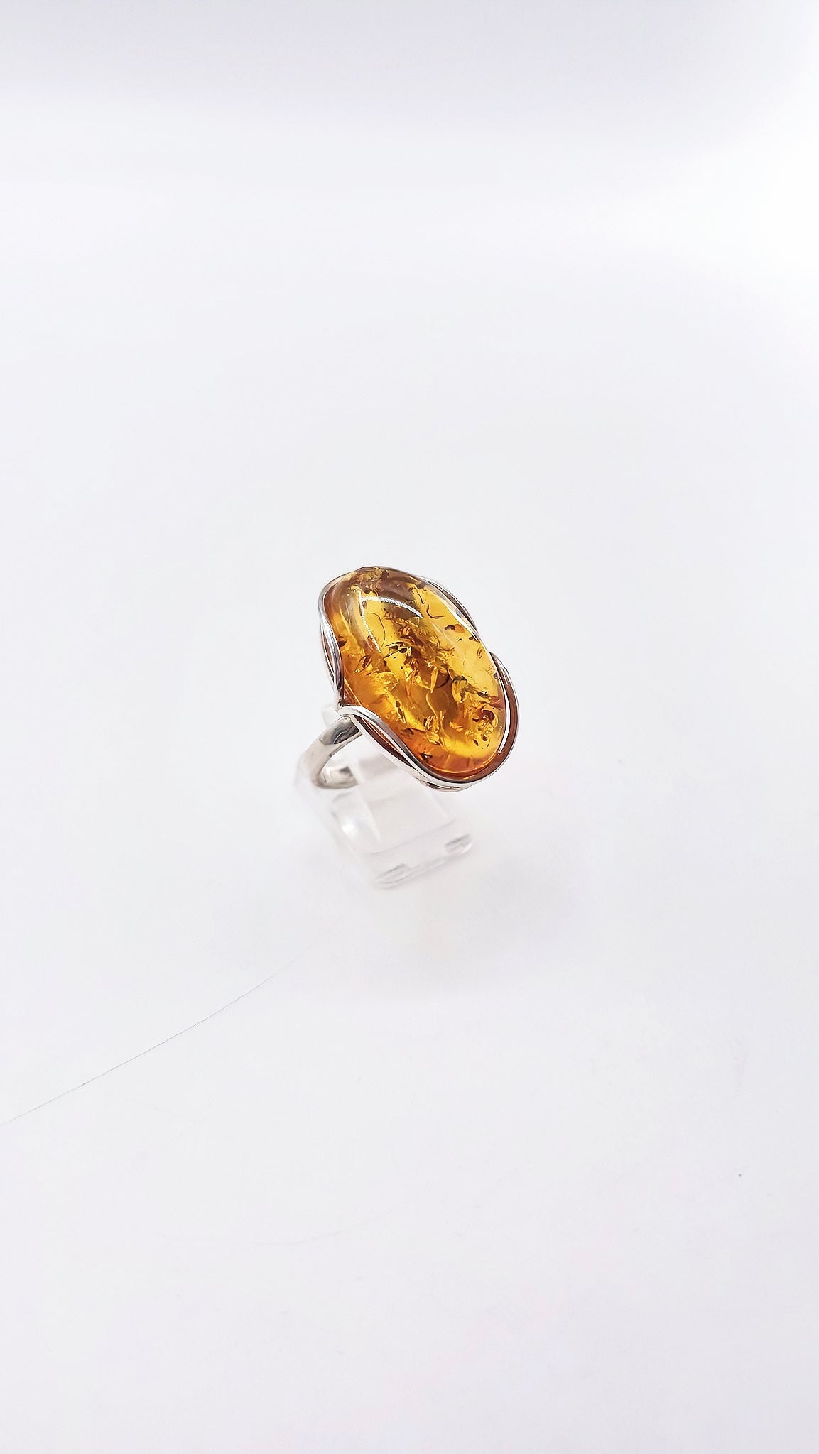 Adjustable silver ring with amber – nature meets style