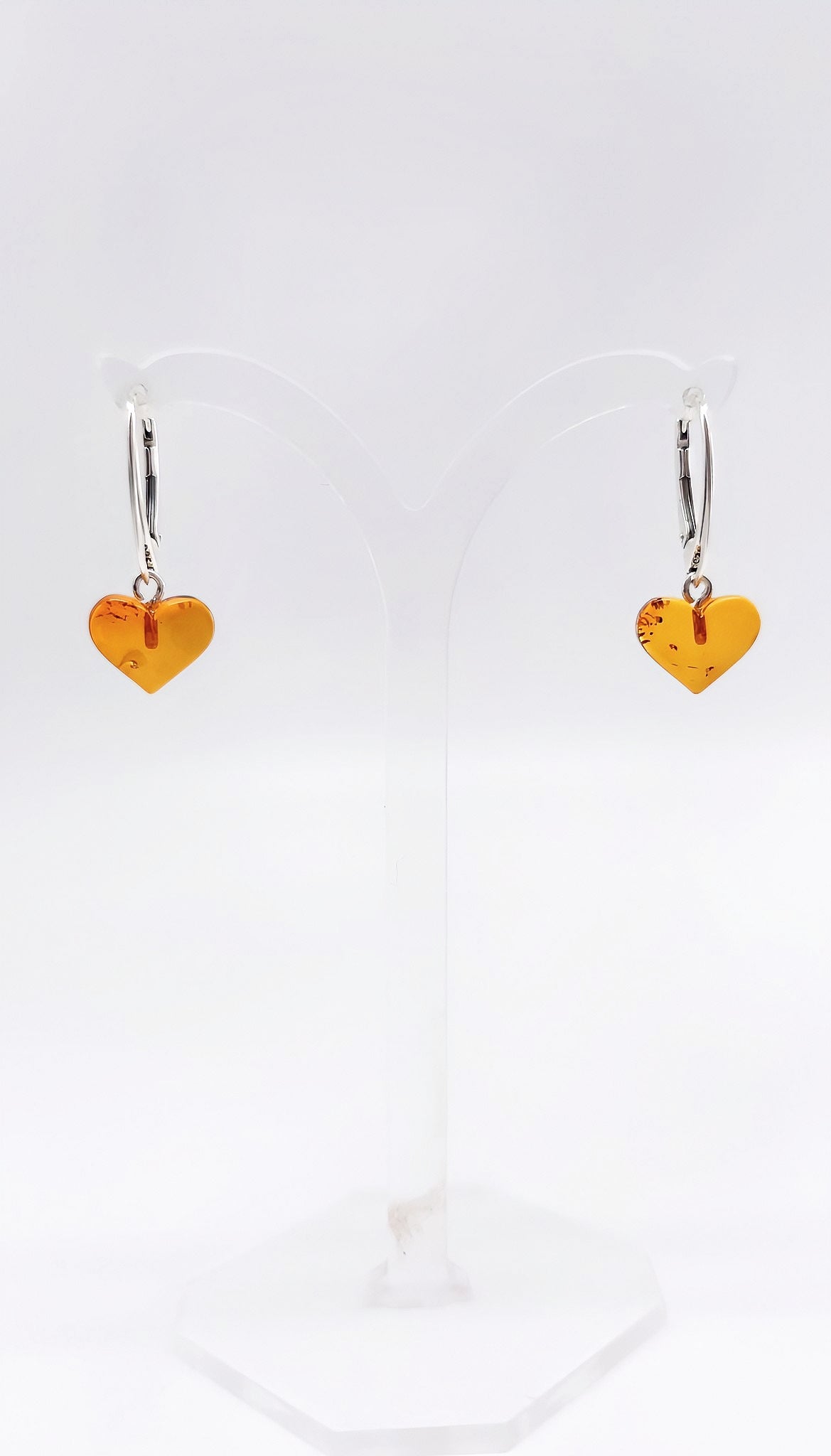 Romantic jewelry set amber hearts in silver setting