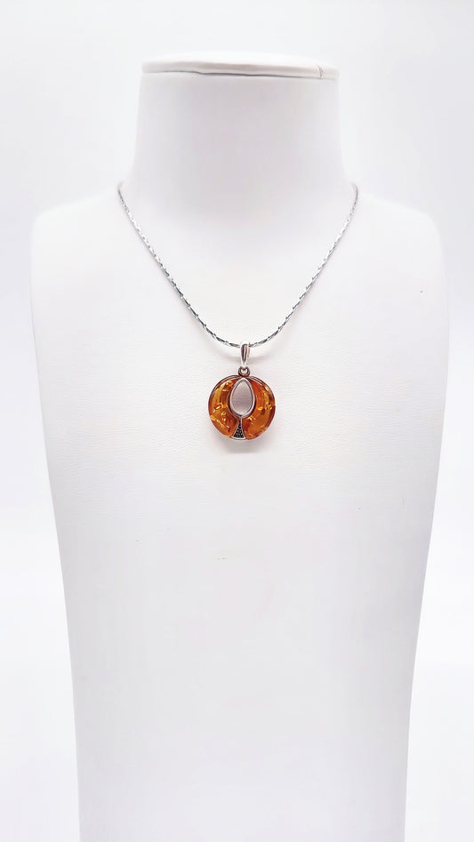 Elegant ladies' pendant made of natural amber and 925 silver