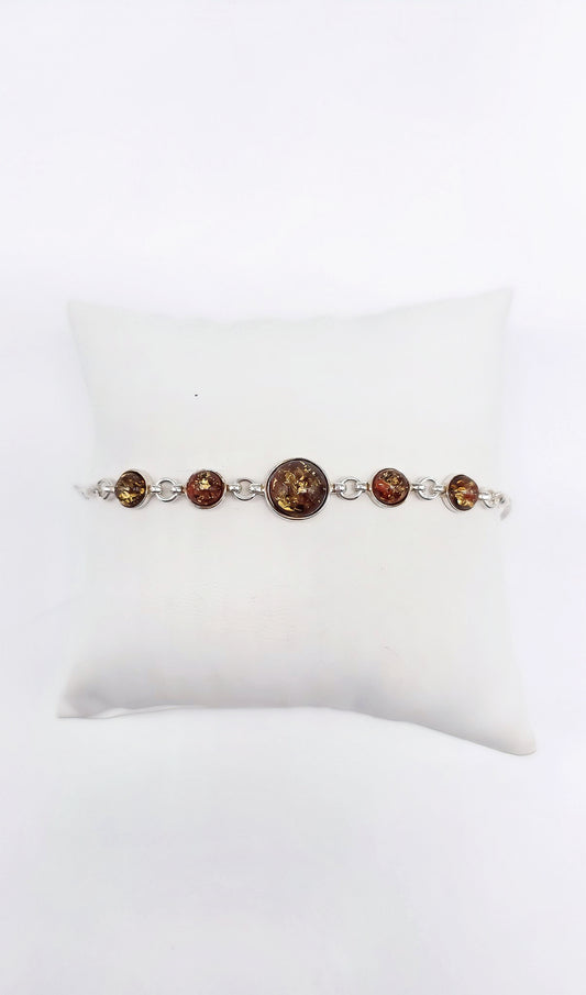 Designer bracelet with unique green-orange amber