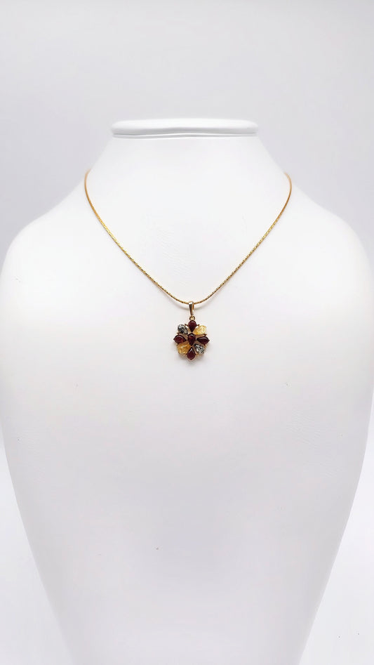 Natural charm: flower pendant with colored amber