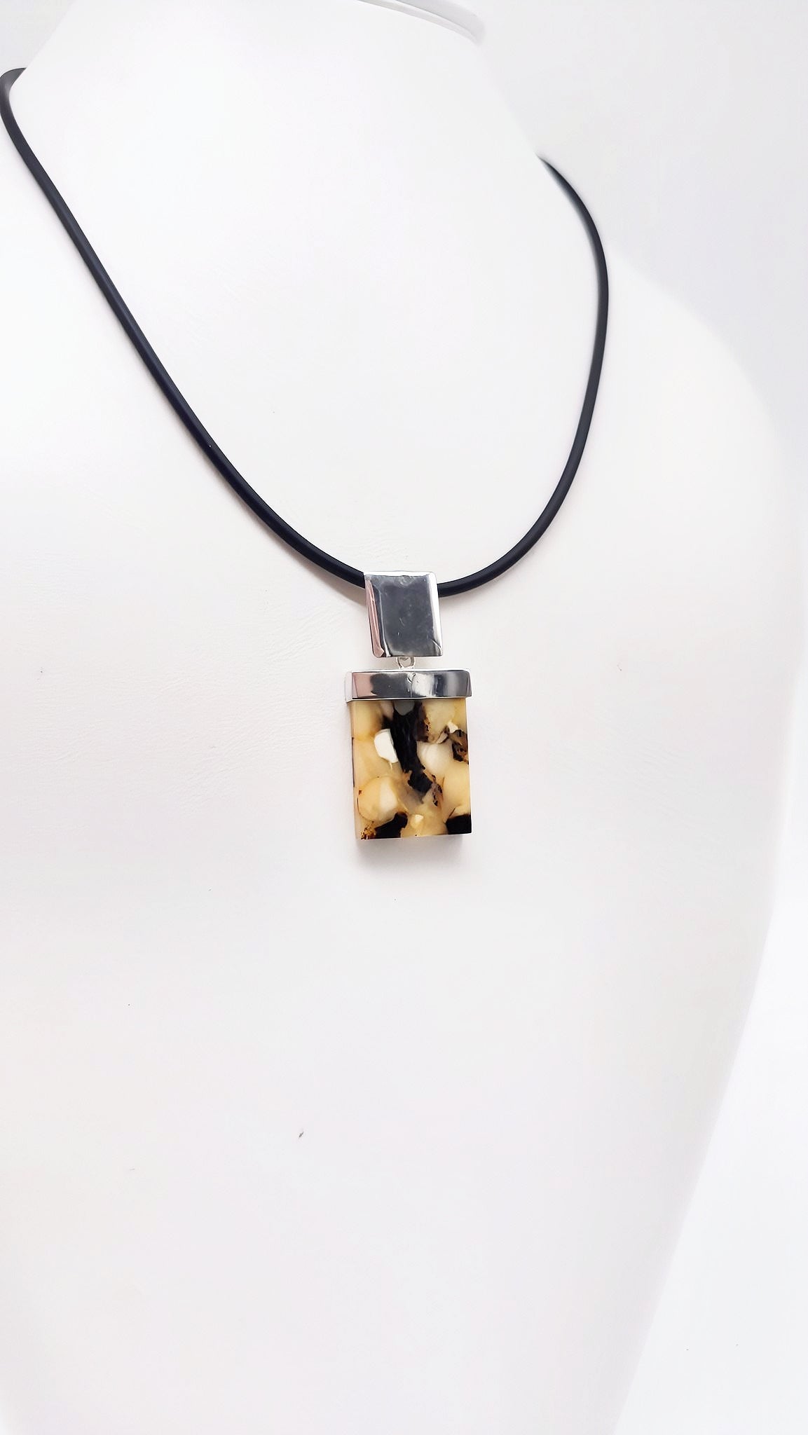 Striking amber pendant for men – handmade
