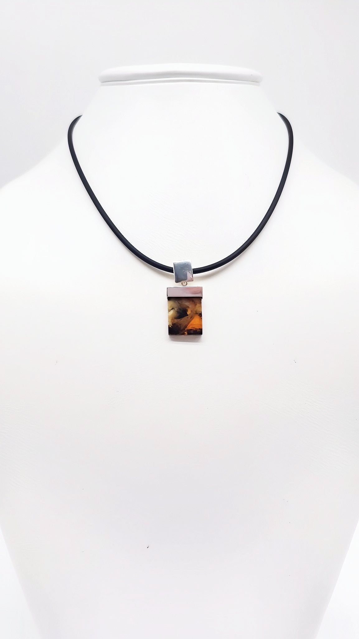 Striking amber pendant for men – handmade