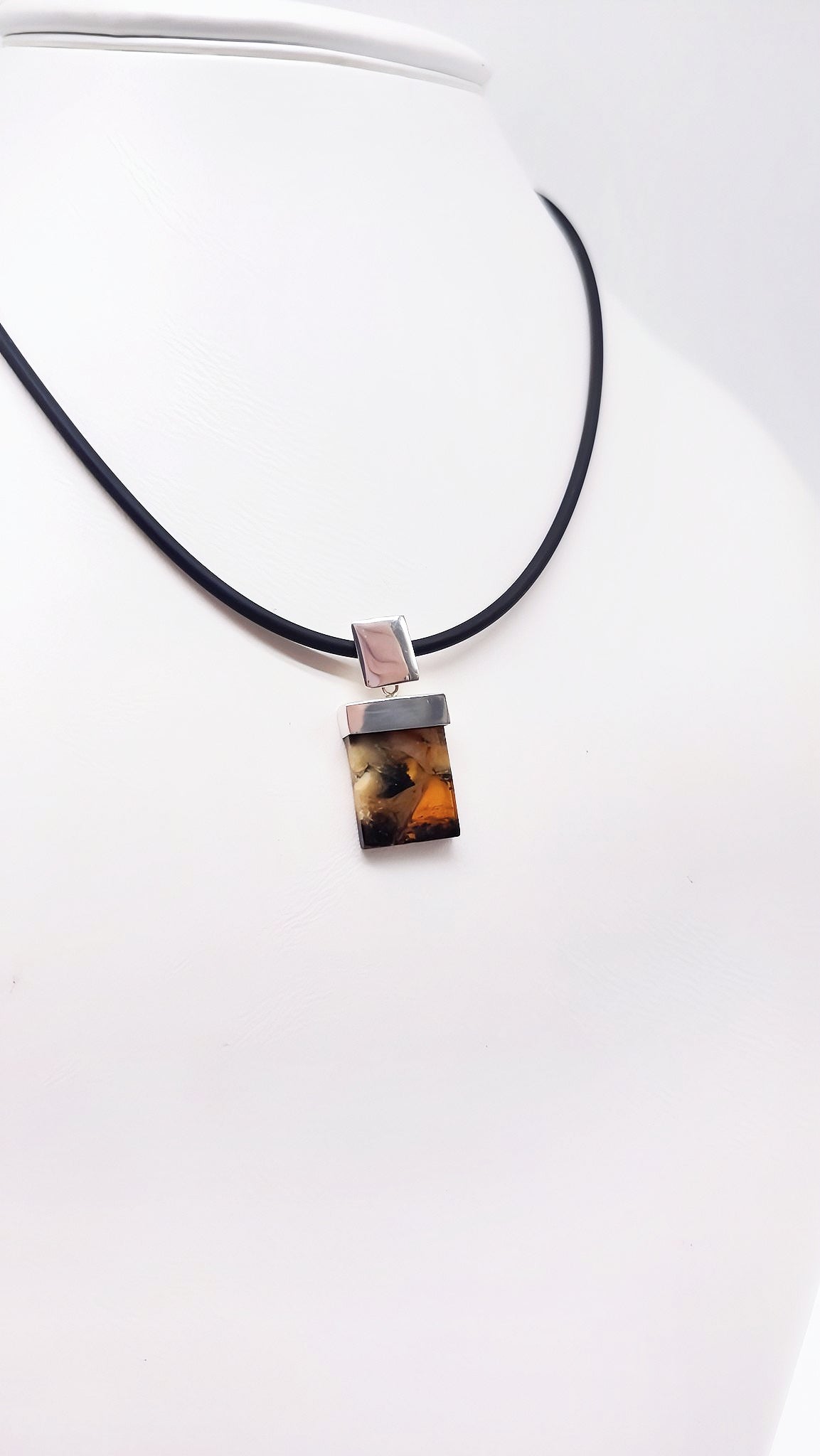 Striking amber pendant for men – handmade