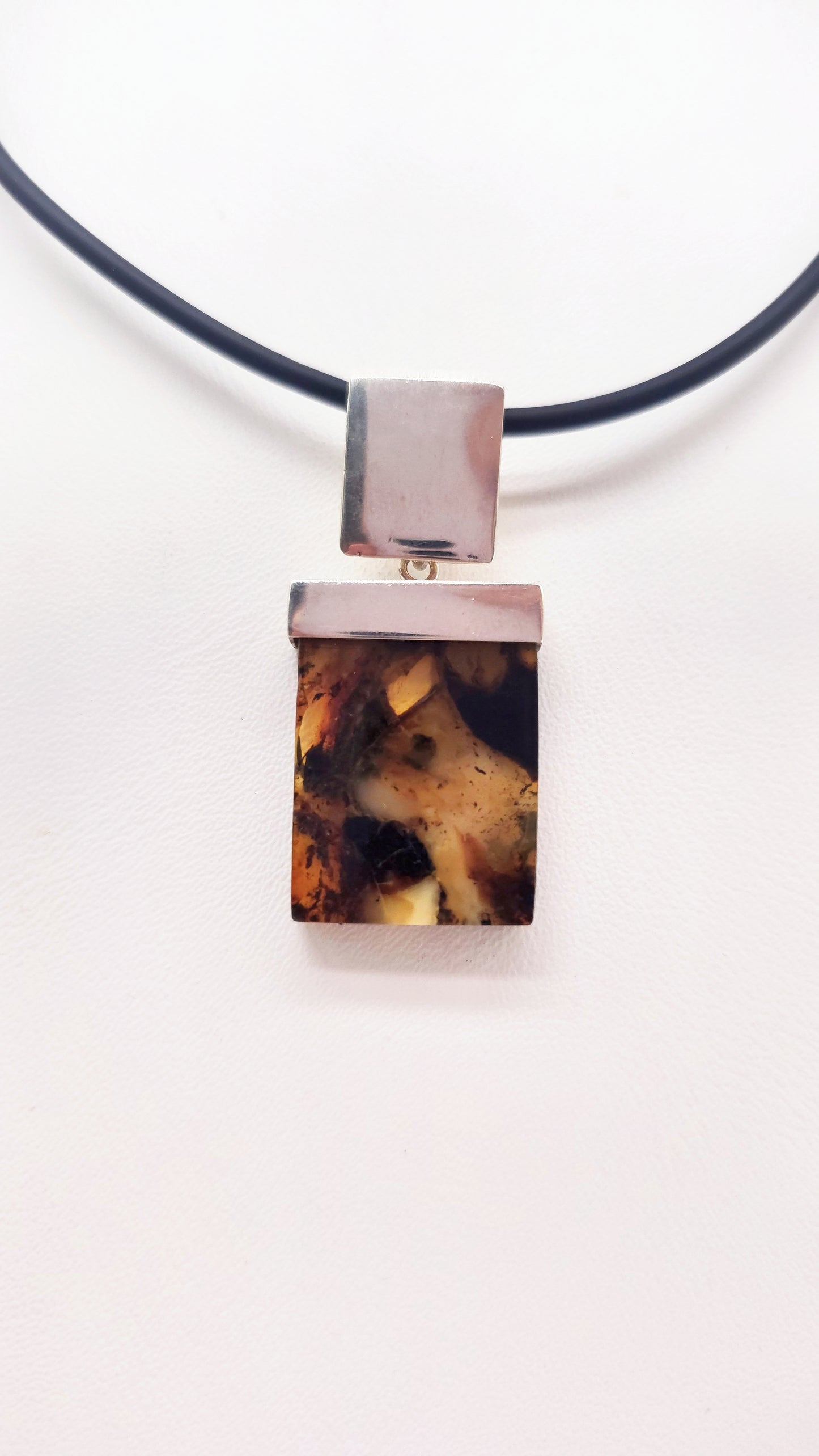 Striking amber pendant for men – handmade