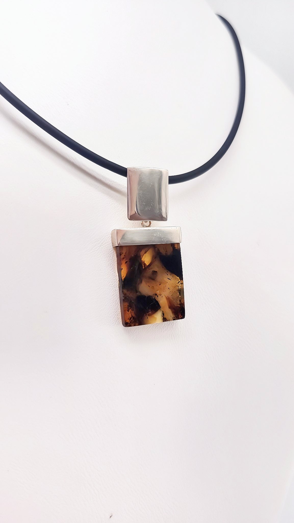Striking amber pendant for men – handmade