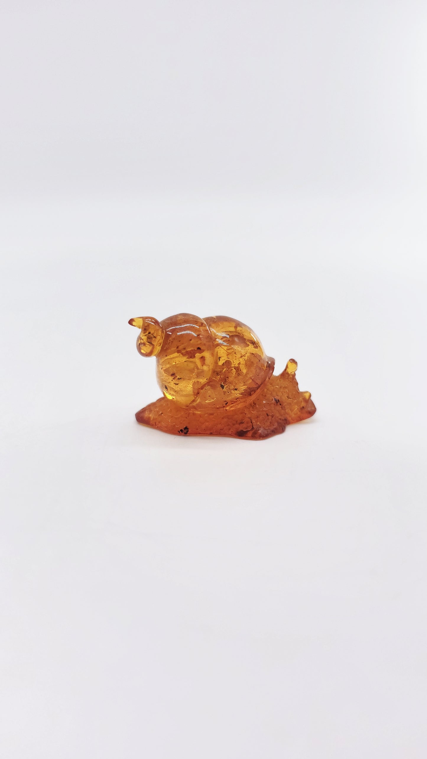 Snail made of natural amber – talisman for gentle progress