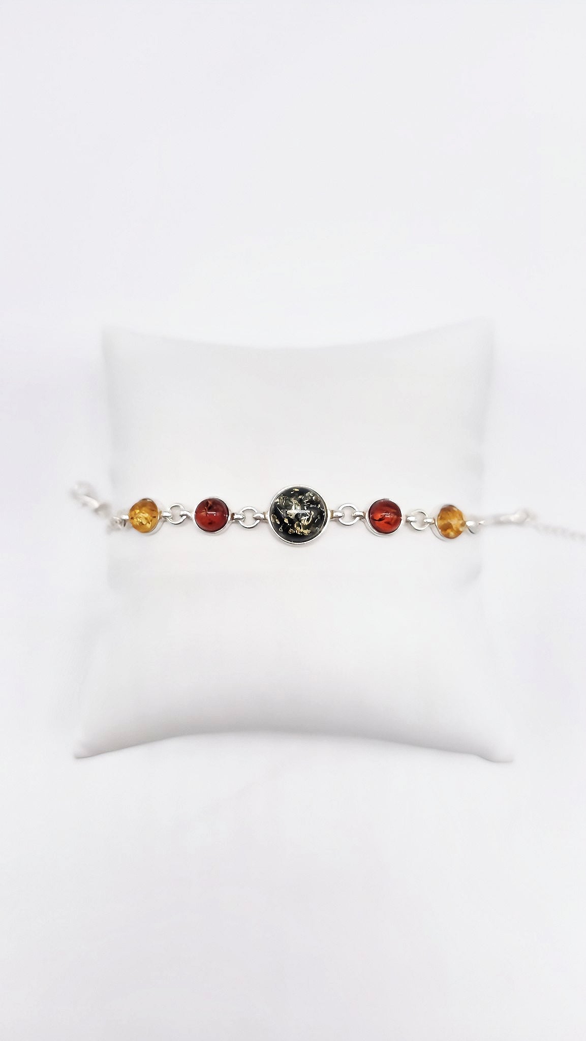 Designer Armband mit einzigartigem grün-orangem Bernstein