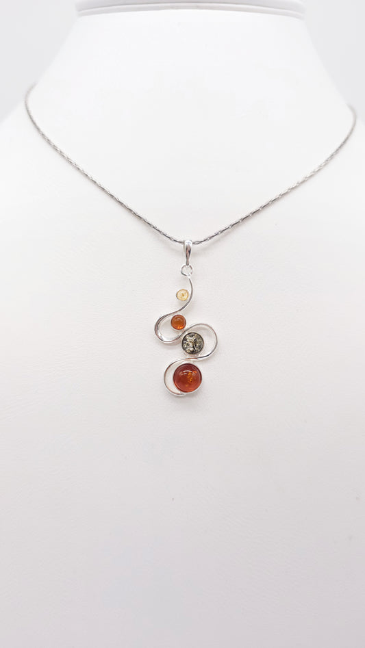 Pendant made of 925 sterling silver with three colorful amber stones