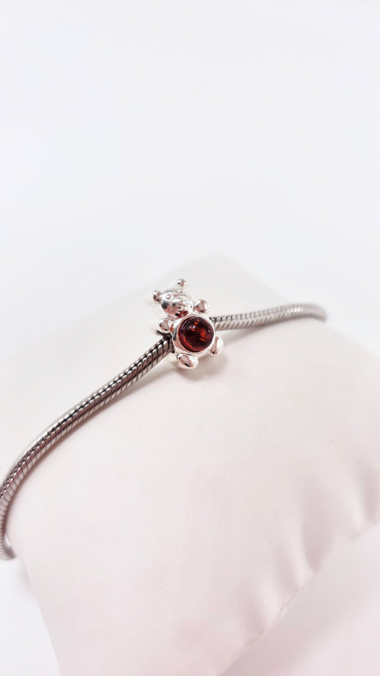 Charm bear with amber – wearable on both sides