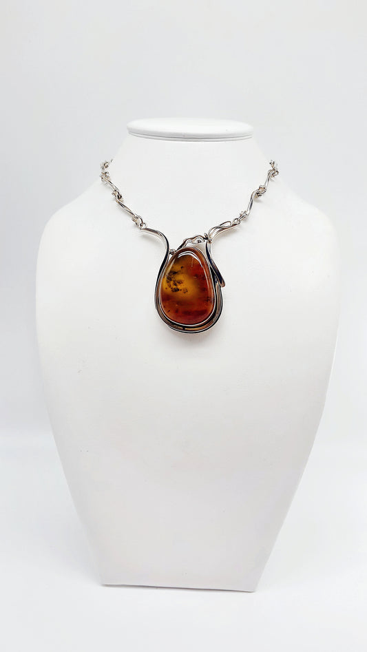 Brilliant amber in silver