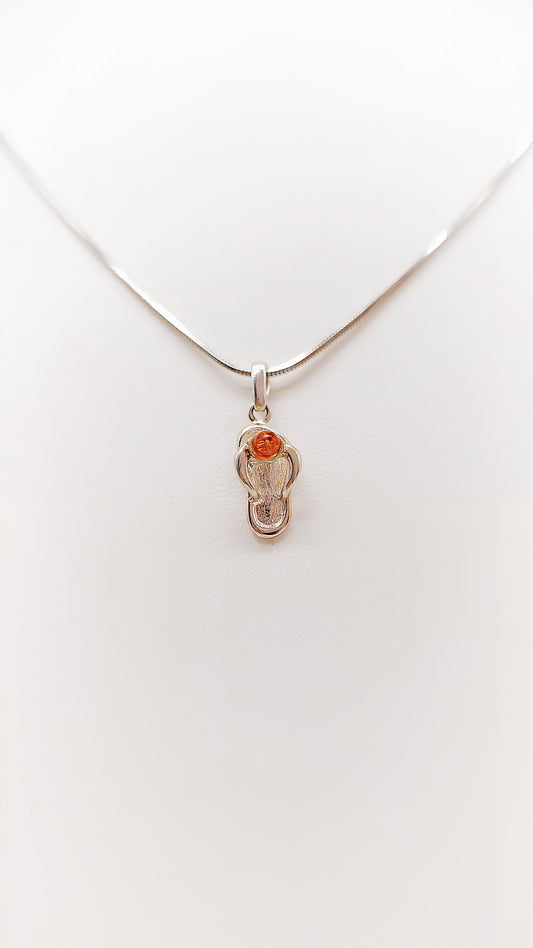 Simple beauty: silver pendant with amber
