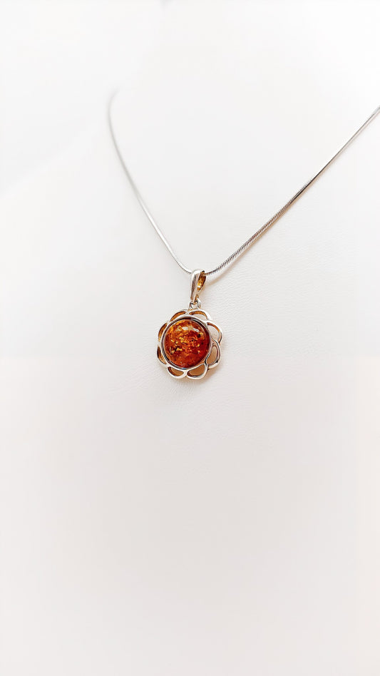 Amber blossom: radiant elegance set in silver