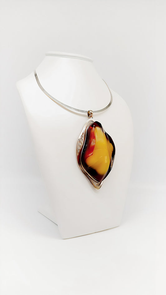 Mystical elegance: unique piece made of amber and silver