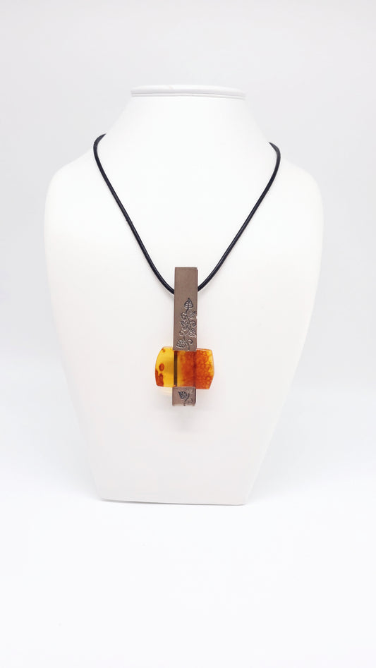 Individual jewelry pendant unique piece made of amber