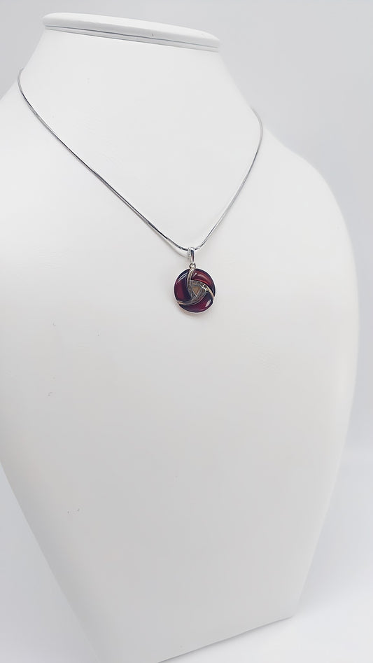 Modern design: silver pendant with amber