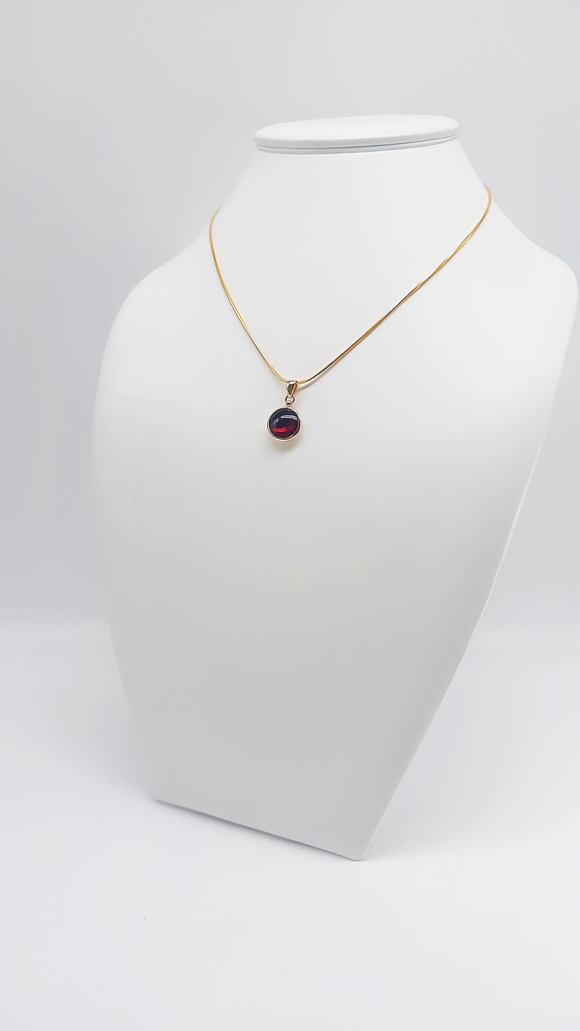 Timeless elegance: gold-plated amber pendant