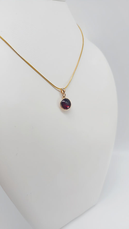 Timeless elegance: gold-plated amber pendant