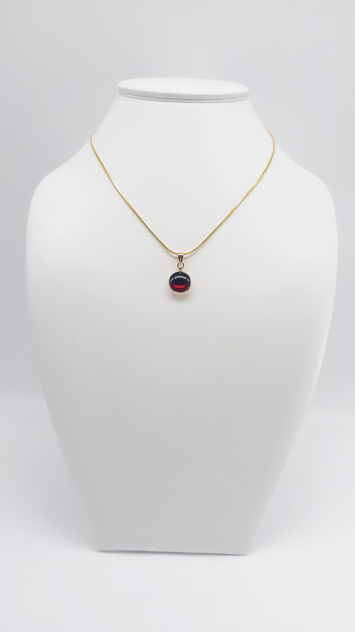 Timeless elegance: gold-plated amber pendant