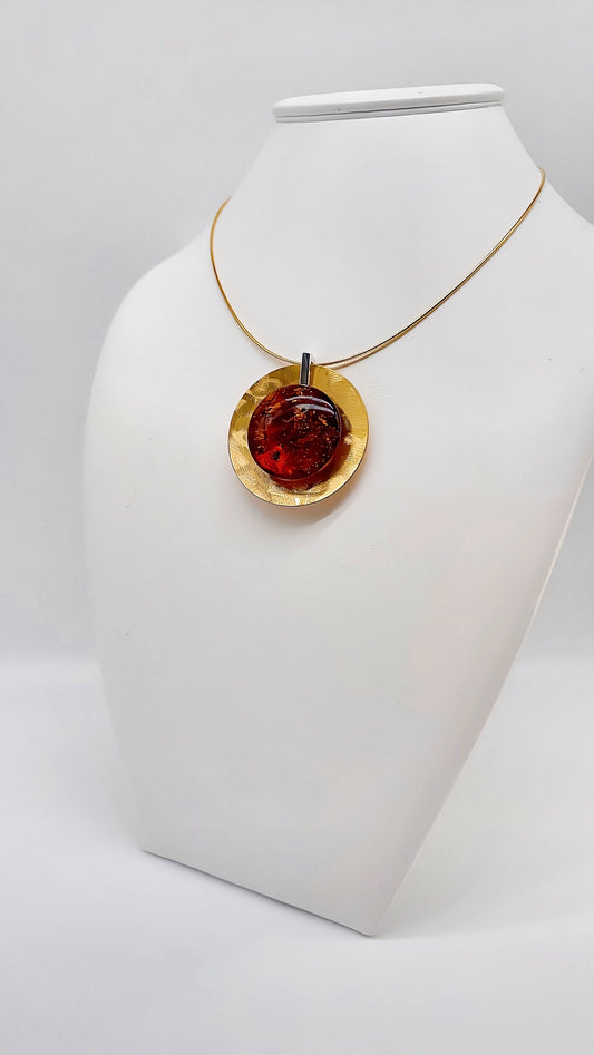 Elegant gold-plated circle pendant with amber