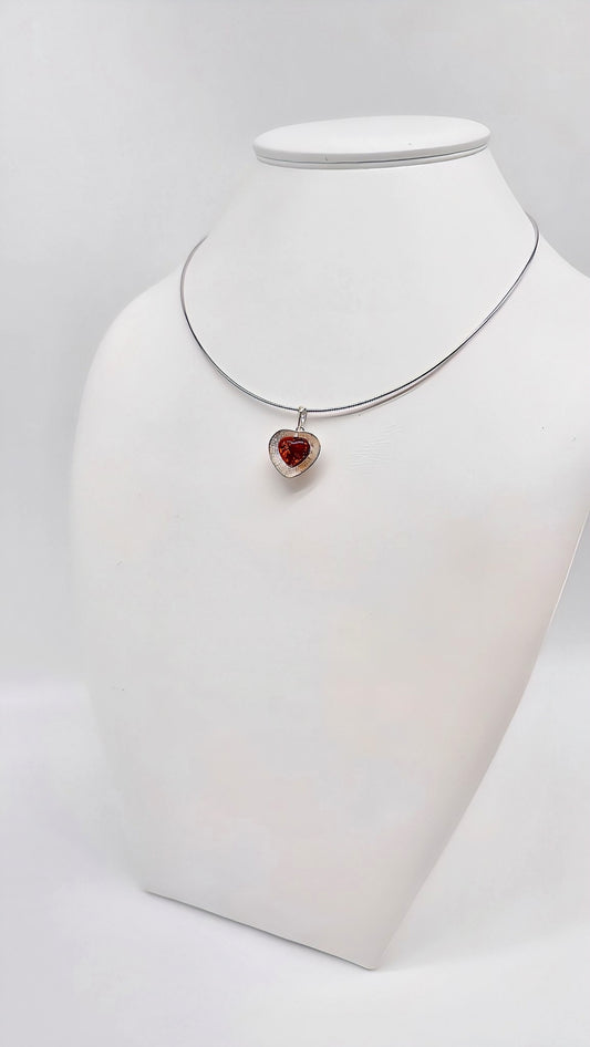Silver heart pendant with amber