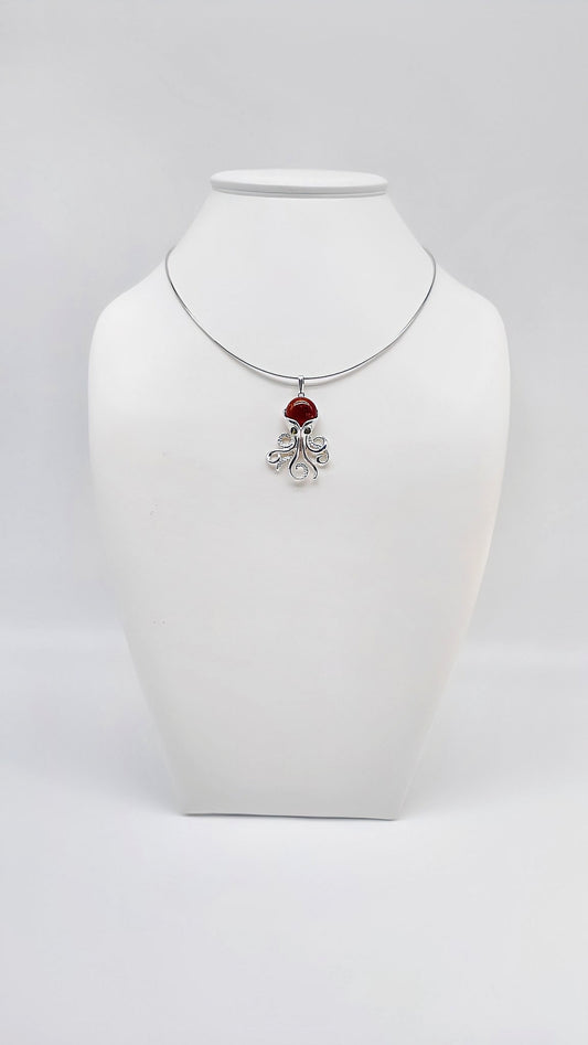Silver octopus pendant with amber
